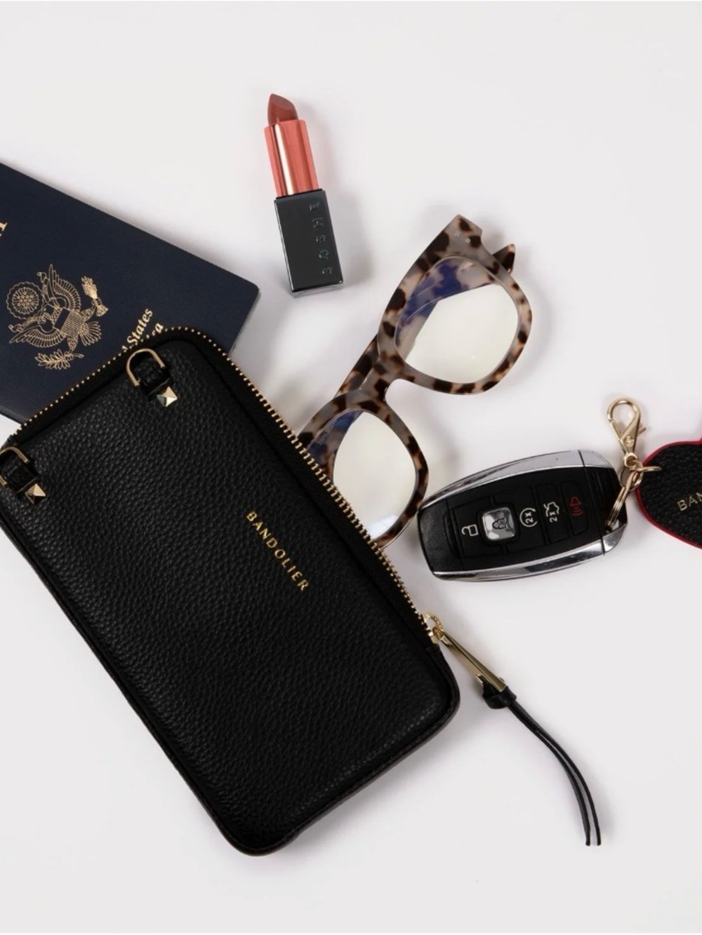 Bandolier Black Pebbled Leather Crossbody Expanded Pouch with Gold Accents